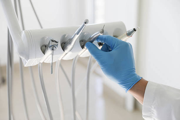 Professional Tooth Extraction technician working in Round Rock, TX